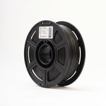 Standard PLA Matte Black 1.75mm filament on a plastic spool